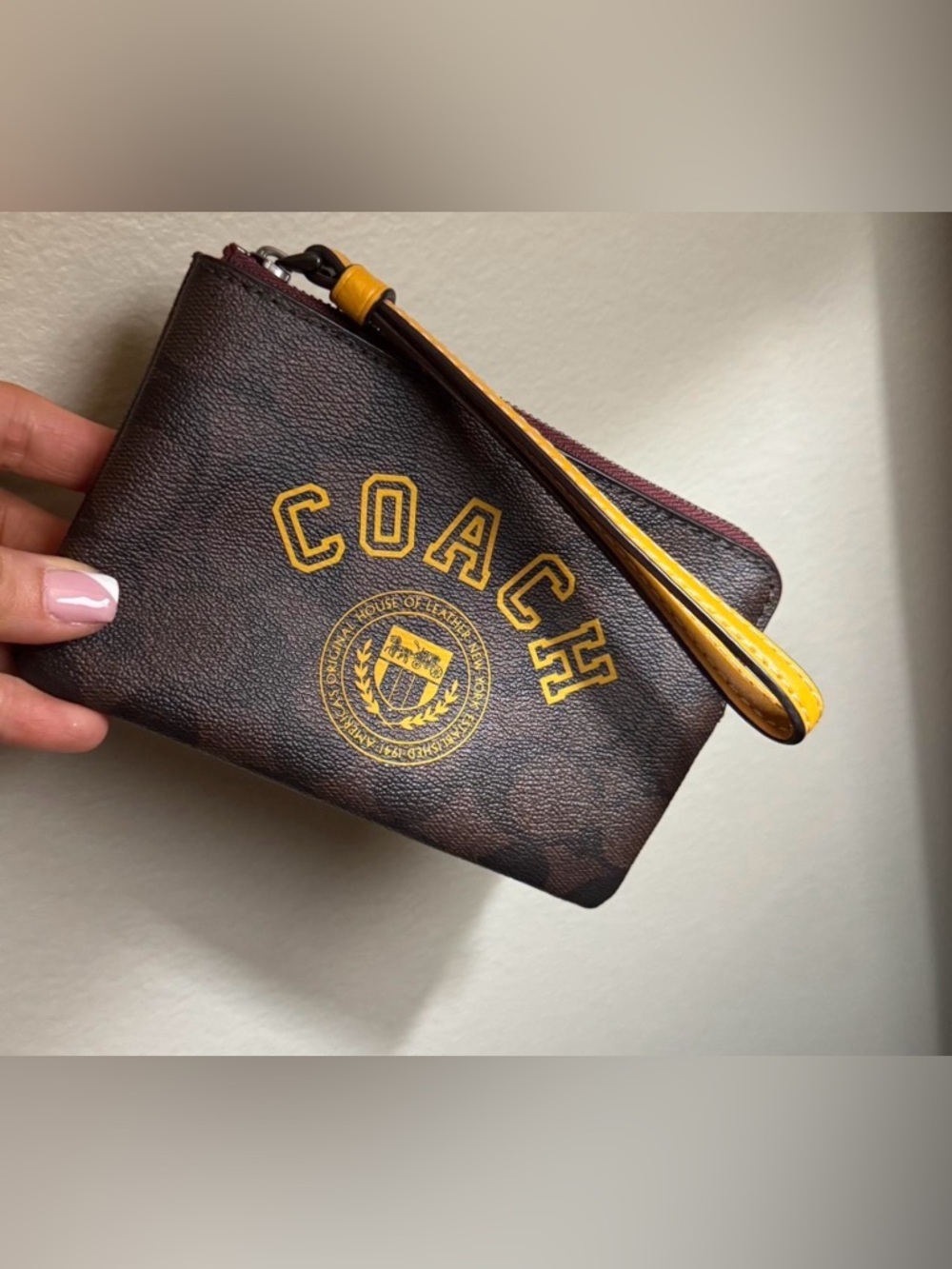 NWT Coach varsity wristlet
